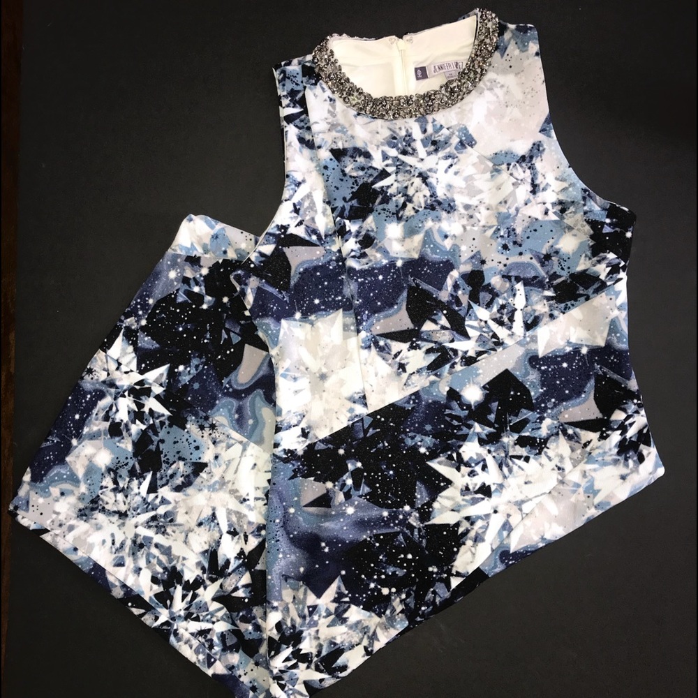 Jenifer Lopez sleeveless sheath dress